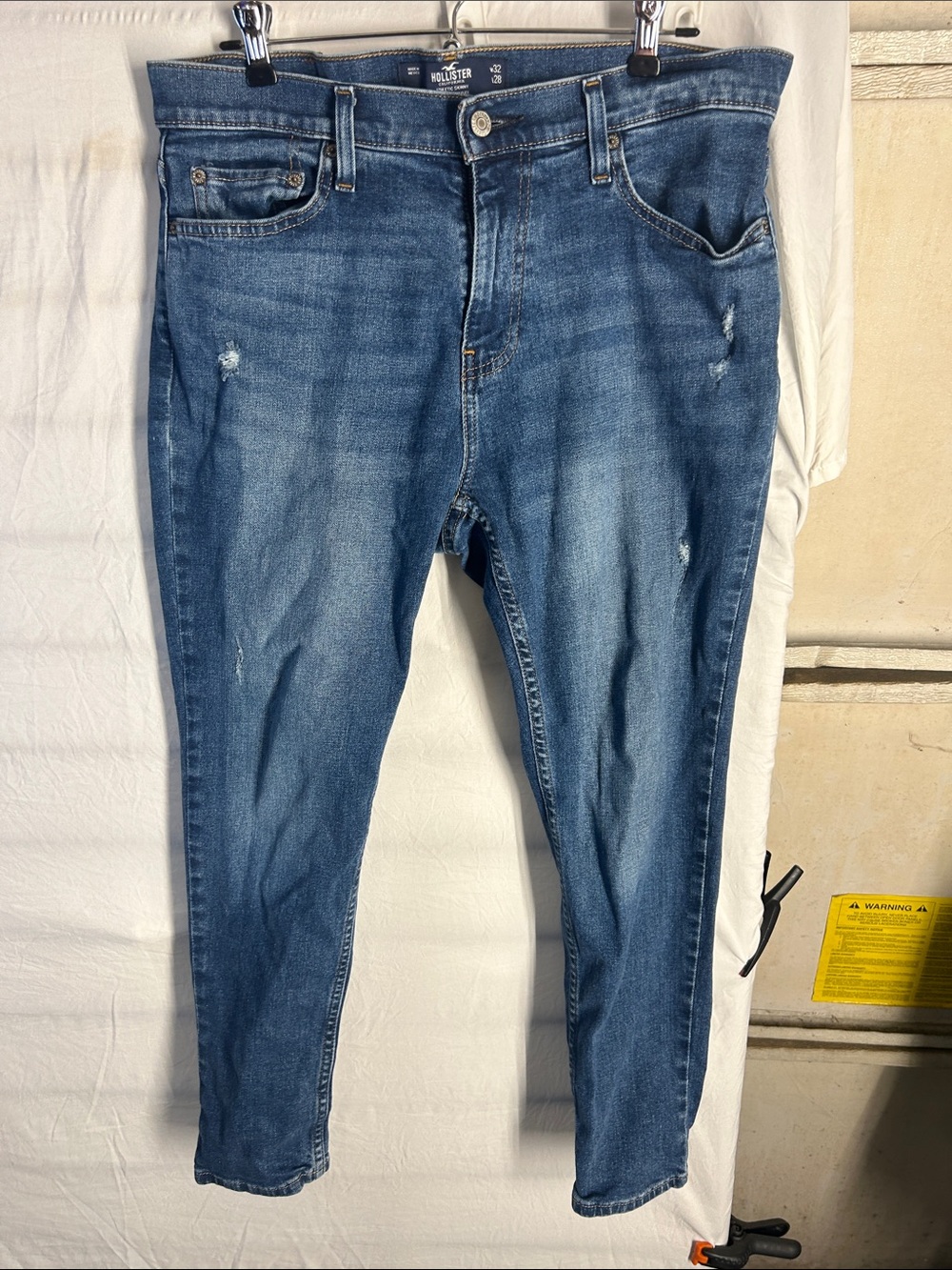 Hollister Men’s Distressed Skinny Jeans in Medium Blue